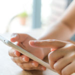 Hand touch the Screen on the Smart Phone